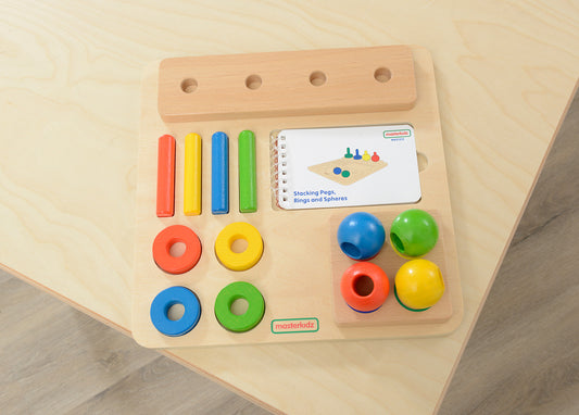 Stacking Pegs, Rings and Spheres