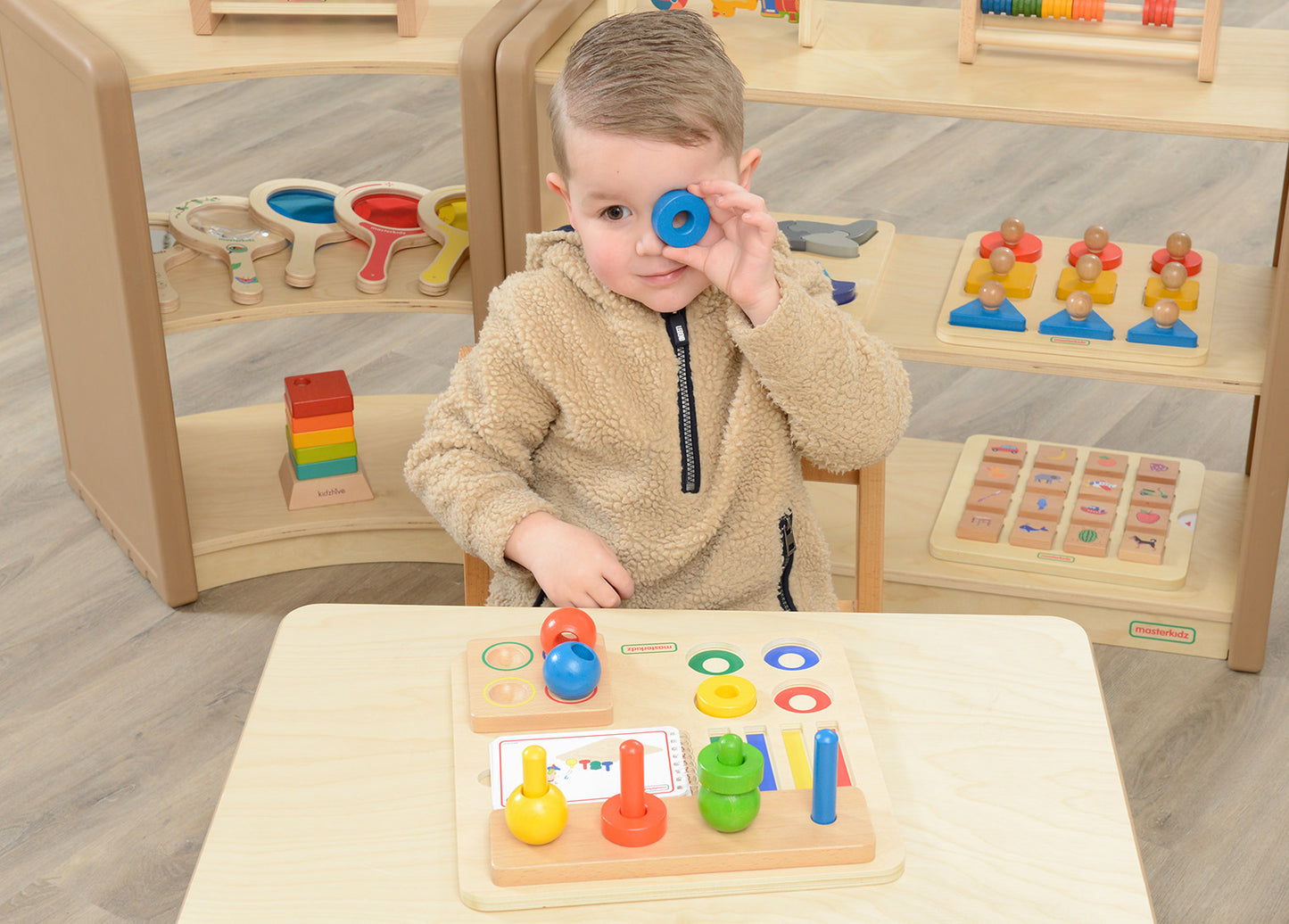 Stacking Pegs, Rings and Spheres