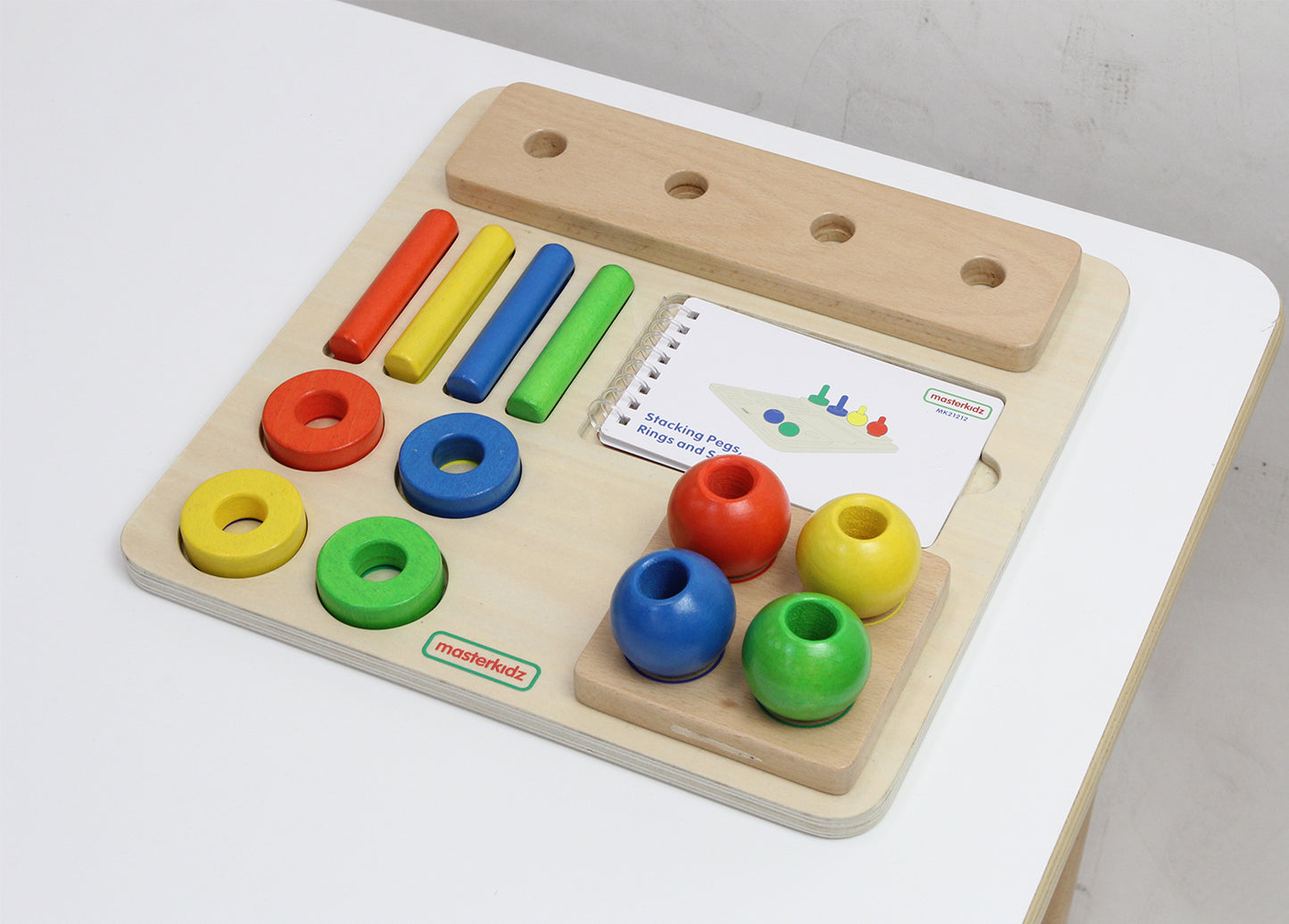 Stacking Pegs, Rings and Spheres