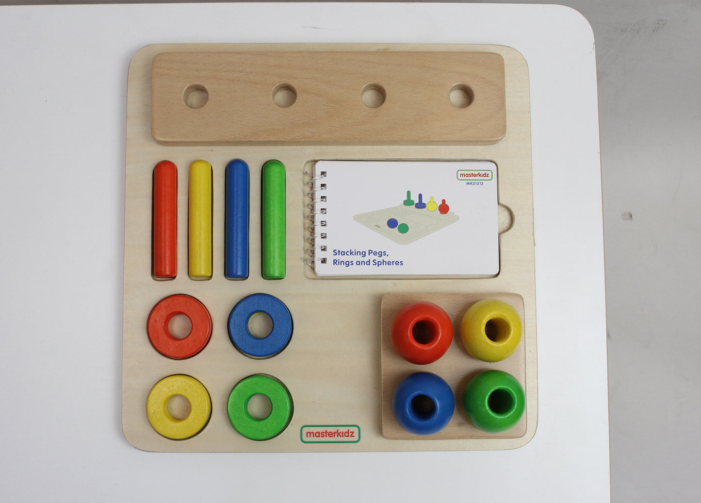 Stacking Pegs, Rings and Spheres