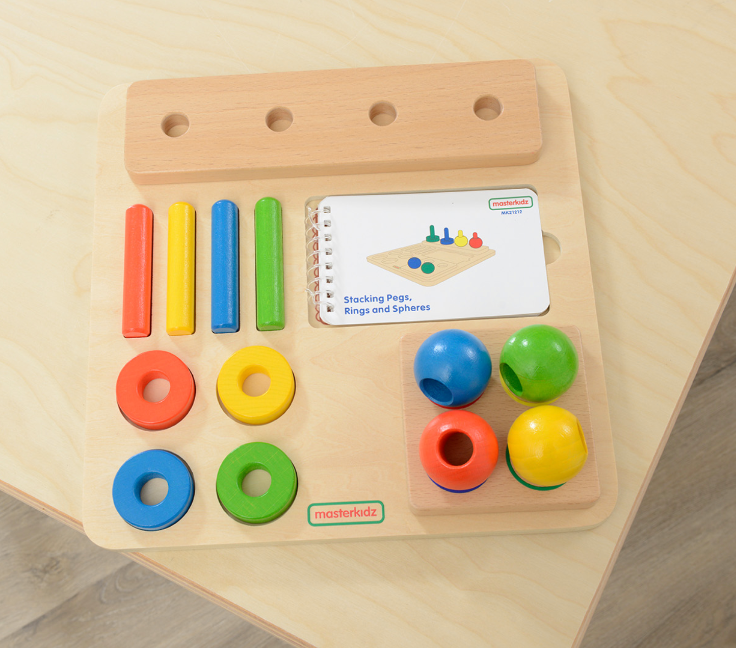 Stacking Pegs, Rings and Spheres